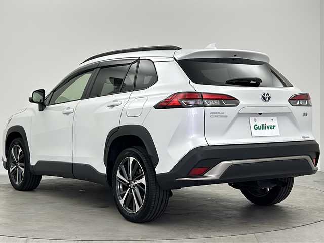 トヨタ カローラ クロス ハイブリッド Z 大阪府 2022(令4)年 1.5万km パール 純正9インチナビ/・Bluetooth/・フルセグTV/・ラジオ/・USB接続/トヨタセーフティセンス/・プリクラッシュセーフティー/・レーンディパーチャーアラート/・ブラインドスポットモニター/・レーダークルーズコントロール/・オートマチックハイビーム/パノラマミックビューモニター/バックカメラ/パワーバックドア/オートホールド/ルーフレール/前席シートヒーター/ビルトインETC