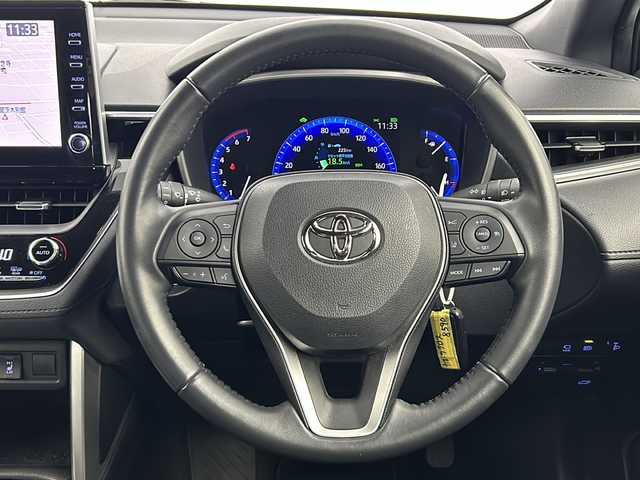 トヨタ カローラ クロス ハイブリッド Z 大阪府 2022(令4)年 1.5万km パール 純正9インチナビ/・Bluetooth/・フルセグTV/・ラジオ/・USB接続/トヨタセーフティセンス/・プリクラッシュセーフティー/・レーンディパーチャーアラート/・ブラインドスポットモニター/・レーダークルーズコントロール/・オートマチックハイビーム/パノラマミックビューモニター/バックカメラ/パワーバックドア/オートホールド/ルーフレール/前席シートヒーター/ビルトインETC