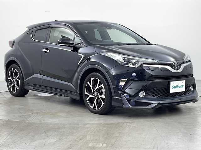 トヨタ Ｃ－ＨＲ G－T 道央・札幌 2016(平28)年 2.3万km ブラックマイカ ・4WD/・純正ナビ&CD&DVD&BT&TV/・バックカメラ/・セーフティセンスP/　プリクラッシュセーフティー/　レーンディパーチャーアシスト/　アダプティブクルーズコントロール/　オートマチックハイビーム/・ブラインドスポットモニター/・モデリスタエアロ/・前席シートヒーター/・ドライブレコーダー/・革巻ステアリング/・ステアリングリモコン/・電動パーキングブレーキ/・自動防眩ミラー/・トノカバー/・純正フロアマット/・純正ドアバイザー/・LEDヘッドライト/・フォグランプ/・オートライト