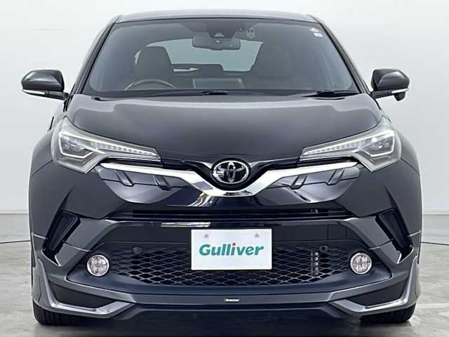 トヨタ Ｃ－ＨＲ G－T 道央・札幌 2016(平28)年 2.3万km ブラックマイカ ・4WD/・純正ナビ&CD&DVD&BT&TV/・バックカメラ/・セーフティセンスP/　プリクラッシュセーフティー/　レーンディパーチャーアシスト/　アダプティブクルーズコントロール/　オートマチックハイビーム/・ブラインドスポットモニター/・モデリスタエアロ/・前席シートヒーター/・ドライブレコーダー/・革巻ステアリング/・ステアリングリモコン/・電動パーキングブレーキ/・自動防眩ミラー/・トノカバー/・純正フロアマット/・純正ドアバイザー/・LEDヘッドライト/・フォグランプ/・オートライト