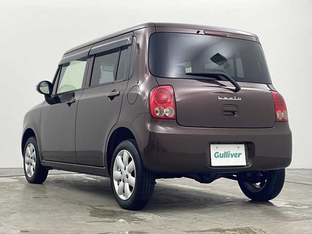 スズキ ラパン X 秋田県 2013(平25)年 6万km マルーンブラウンパール 4WD/ABS/盗難防止装置/D席シートヒーター/電動格納ミラー/ウィンカーミラー/純正オーディオ/ヘッドライトレベライザー/純正アルミホイール/純正フロアマット/サイドバイザー