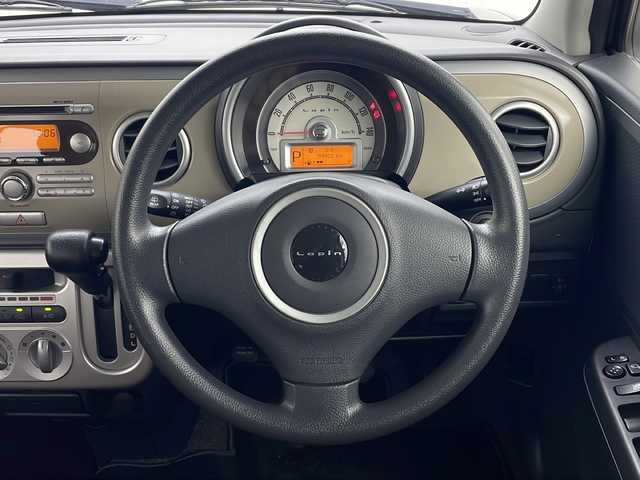 スズキ ラパン X 秋田県 2013(平25)年 6万km マルーンブラウンパール 4WD/ABS/盗難防止装置/D席シートヒーター/電動格納ミラー/ウィンカーミラー/純正オーディオ/ヘッドライトレベライザー/純正アルミホイール/純正フロアマット/サイドバイザー