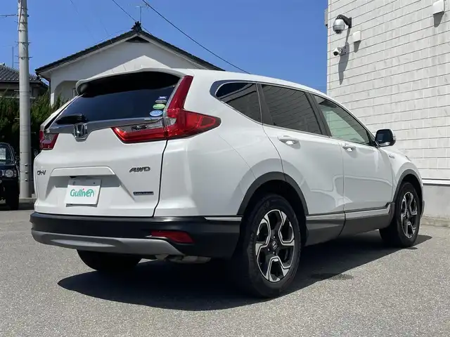 ホンダ ＣＲ－Ｖ ハイブリッド EX 山形県 2019(平31)年 5.9万km プラチナホワイトパール 禁煙車/4WD/ホンダセンシング/純正ナビ/フルセグTV/DVD/Bluetooth/リアカメラ/レーダークルーズコントロール/運転席パワーシート/スマートキー/シートヒーター/電子制御パーキングブレーキ/ETC/前後ドライブレコーダー/保証書/取扱説明書