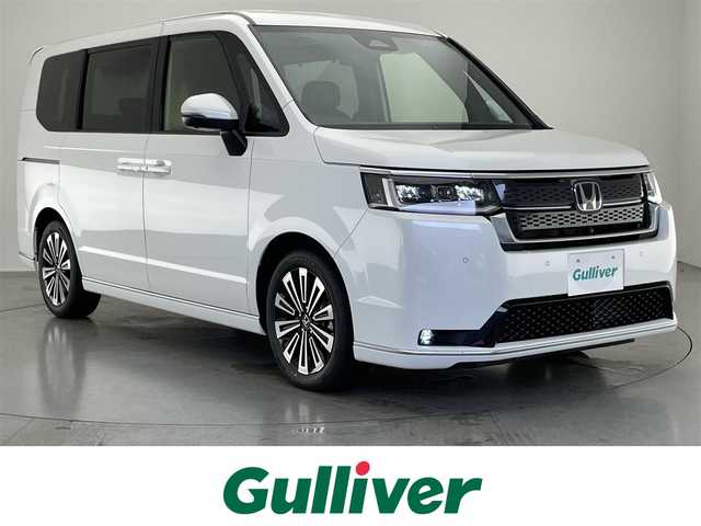 ホンダ ステップワゴン スパーダ eHEV プレミアムライン 愛知県 2025(令7)年 0.1万km未満 プラチナホワイトパール 登録済未使用車　ホンダコネクトナビ装着用スペシャルＰＫＧ　マルチビューカメラ　ＢＳＭ　ホンダセンシング　衝突軽減装置　追従クルコン　ハーフレザー　シートヒーター　電動リアゲート　両側パワスラ　禁煙車