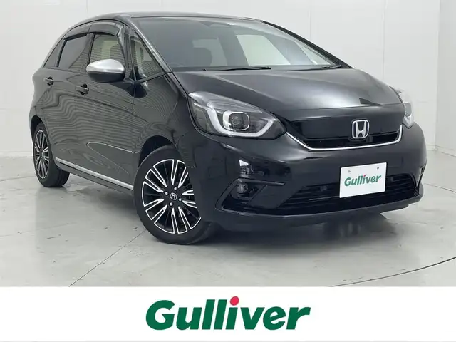 ホンダ フィット e:HEVリュクス 茨城県 2020(令2)年 5.7万km クリスタルブラックパール プッシュスタート/アイドリングストップ/追従型クルーズコントロール/ビルトインETC/バックカメラ/純正9インチナビ/フルセグテレビ/Bluetooth/DVD/ハーフレザーシート/シートヒーターD+N席/LEDヘッドライト/オートライト/オートマチックハイビーム/レーンキープアシスト