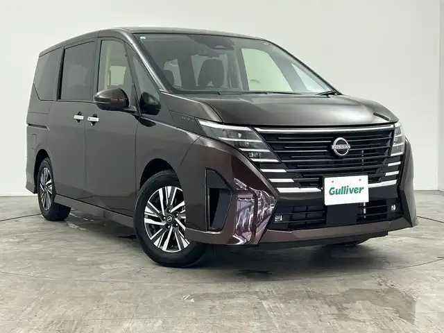日産 セレナ ハイウェイスター V 三重県 2023(令5)年 0.6万km インペリアルアンバーP 禁煙車/プロパイロット/アラウンドビューモニター　/メーカー１２型ナビ　/AM/FM/BT/USB/HDMI/フルセグTV/スマホ連動/インテリジェントミラー　/純正ドライブレコーダー　/クリアランスソナー　/両側パワースライドドア　/ＢＳＭ　　/置くだけ充電　/ＥＴＣ/パドルシフト/純正LEDライト/オートハイビーム/フォグライト/電動パーキングブレーキ/オートホールド/保証書