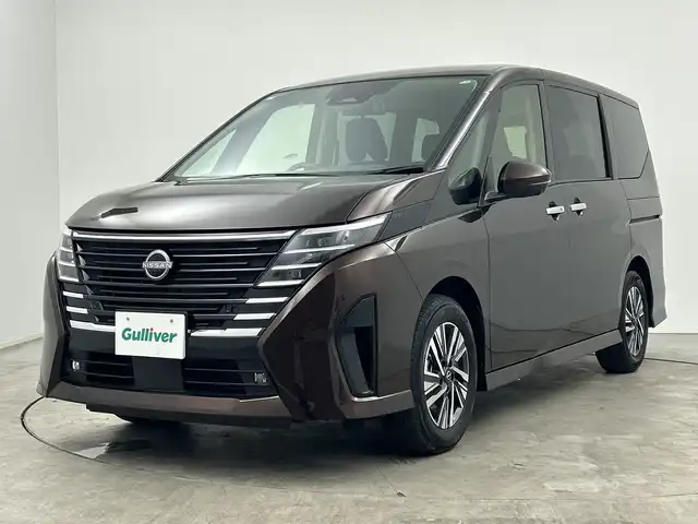 日産 セレナ ハイウェイスター V 三重県 2023(令5)年 0.6万km インペリアルアンバーP 禁煙車/プロパイロット/アラウンドビューモニター　/メーカー１２型ナビ　/AM/FM/BT/USB/HDMI/フルセグTV/スマホ連動/インテリジェントミラー　/純正ドライブレコーダー　/クリアランスソナー　/両側パワースライドドア　/ＢＳＭ　　/置くだけ充電　/ＥＴＣ/パドルシフト/純正LEDライト/オートハイビーム/フォグライト/電動パーキングブレーキ/オートホールド/保証書