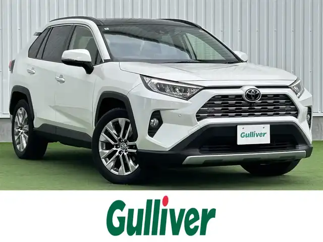 トヨタ ＲＡＶ４ G Zパッケージ 香川県 2021(令3)年 2.8万km ホワイトパールクリスタルシャイン 純正9インチディスプレイオーディオ/→AM/FM/Bluetooth/パノラマムーンルーフ/全方位カメラ/パワーバックドア/寒冷地仕様/ブラインドスポットモニター/衝突軽減ブレーキ/レーダークルーズコントロール/レーンキープアシスト/ドライブレコーダー/レザーシート/ハンドルヒーター/シートヒーター/パワーシート/メモリーシート/LEDヘッドライト/オートハイビーム/コーナーセンサー/スマートキー/プッシュスタート/スマートキー/社外フロアマット/純正19インチアルミホイール/ステアリングスイッチ
