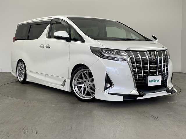 トヨタ アルファード G 兵庫県 2020(令2)年 4.9万km ホワイトパールクリスタルシャイン ・ワンオーナー車/・純正ナビ/CD/DVD/SD/TV/Bluetooth接続/・純正リアフリップダウンモニター/・両側パワースライドドア/・前席パワーシート/・運転席メモリーシート/・革シート/・前席シートヒーター/ベンチレーション/・パワーバックドア/・デジタルインナーミラー/・TRDエアロ/・前方ドライブレコーダー/・AC100V電源/・nanoeエアコン/・WORK20インチアルミホイール/・社外車高調/・社外マフラー/・3眼LEDヘッドランプ/・LEDフォグランプ/・ビルトインETC2.0/・スマートキー/・スペアキー/・純正ウッドコンビステアリング/・取扱説明書/・カーテンエアバッグ/・トヨタセーフティセンス/・プリクラッシュセーフティ/・レーントレーシングアシスト/・レーダークルーズコントロール/・ロードサインアシスト/・アダプティブハイビームシステム/・先行車発進告知機能/・ブラインドスポットモニター/・前後クリアランスソナー/・バックガイドモニター/・ドライブスタートコントロール/・車両運動統合制御システム/・パーキングサポートブレーキ