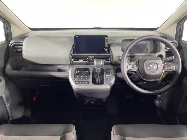 ホンダ フリード ハイブリット e:HEV クロスター 福岡県 2025(令7)年 0.1千km メテオロイドグレーメタリック 禁煙車/純正9インチナビ（LXM-242ZFNI）/フルセグテレビ/バックカメラ/レーダークルーズコントロール/LEDヘッドライト/シートヒーター/純正15インチアルミホイール/両側パワースライドドア/スマートキー/プッシュスタートエンジン/革巻きステアリング/ブラインドスポットモニター