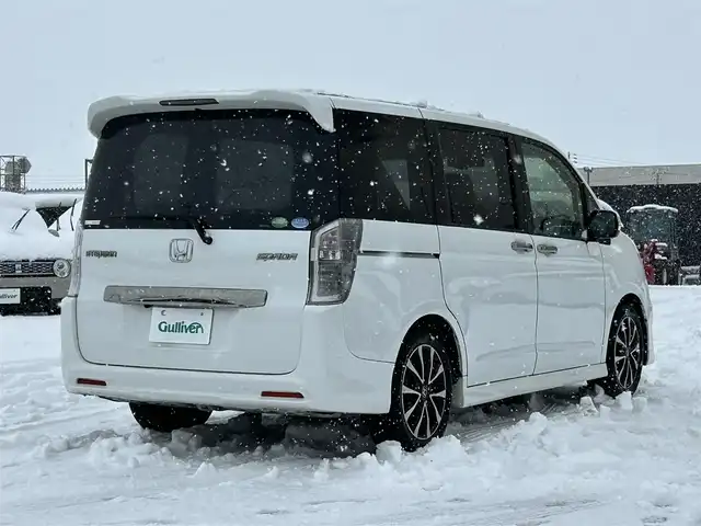 ホンダ ステップワゴン スパーダ Z クールスピリット 山形県 2013(平25)年 6.6万km ホワイトオーキッドパール 純正メモリナビ/　　【CD DVD ワンセグ USB】/バックカメラ/両側パワースライドドア/クルーズコントロール/HIDオートヘッドライト/ハーフレザーシート/純正17インチアルミホイール/アイドリングストップ/パドルシフト/ドライブレコーダー/電動格納ウィンカーミラー/フォグランプ/スマートキー/ETC