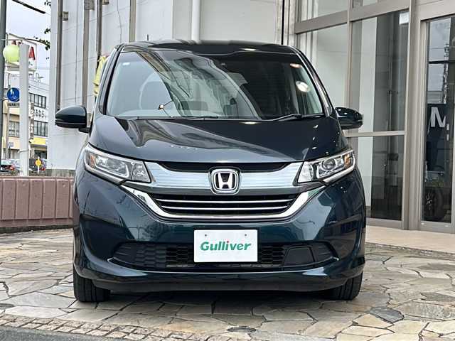 ホンダ フリード ハイブリット G ホンダセンシング 静岡県 2019(平31)年 6.8万km フォレストグリーンパール 純正ナビ/（Bluetooth／CD／DVD／フルセグTV）/バックカメラ/ビルトインＥＴＣ/レーダークルーズコントロール/両側パワースライドドア/衝突被害軽減システム/レーンキープ/ＬＥＤヘッドライト/オートライト/盗難防止装置/横滑り防止装置/3列シート/プッシュスタート/スマートキー
