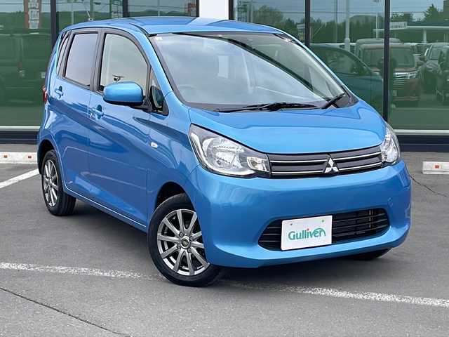 三菱 ｅＫワゴン M 道東・釧路十勝 2014(平26)年 7.6万km ブリリアントターコイズM ・４WD/・純正オーディオ/（CD・AM・FM）/・アイドリングストップ/・リモコンキー/・ETC/・社外エンジンスターター/・純正フロアマット/・社外革調シートカバー