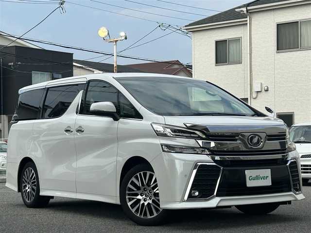 トヨタ ヴェルファイア Z Gエディション 兵庫県 2016(平28)年 3.1万km ホワイトパールクリスタルシャイン ALPINE11型ナビ(EX11)/DVD/CD/BT/フルセグTV/パワーハッチバックドア/両側パワースライド/1列・2列目パワーシート/運転席メモリーシート/ステアリングヒーター/トヨタセーフティーセンス/アダプティブクルーズコントロール/衝突軽減ブレーキ/レーンアシスト/ETC/オットマンシート/LEDヘッドライト/バックカメラ/UVカットガラス/ABS/横滑り防止/デュアルエアバック/取説・保証書
