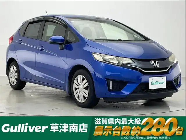 ホンダ フィット 15X 滋賀県 2013(平25)年 7.2万km ブリリアントスポーティブルーメタリック2トーン 社外7インチポータブルナビ/【Bluetooth/CD/DVD/フルセグTV】/ETC/プッシュスタート/スマートキー/ステアリングリモコン/ドアバイザー