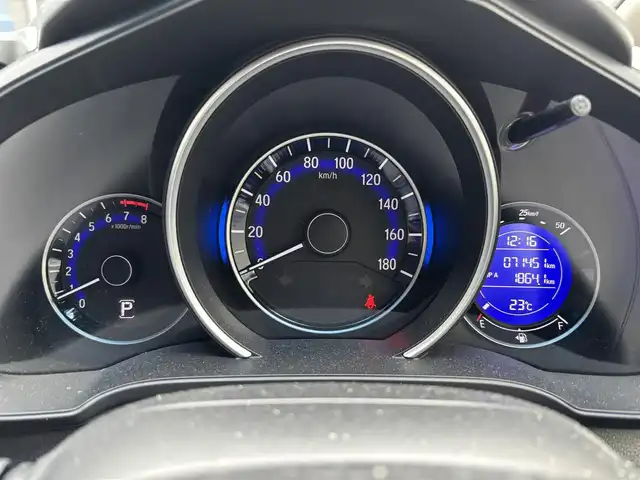 ホンダ フィット 15X 滋賀県 2013(平25)年 7.2万km ブリリアントスポーティブルーメタリック2トーン 社外7インチポータブルナビ/【Bluetooth/CD/DVD/フルセグTV】/ETC/プッシュスタート/スマートキー/ステアリングリモコン/ドアバイザー
