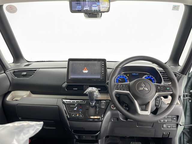 三菱 デリカミニ T プレミアム 長野県 2025(令7)年 0.1千km 緑 4WD/9型ディスプレイオーディオ/（Bluetooth＆AppleCarPlay＆AndroidAuto）/全周囲カメラ/プロパイロット/・追従型クルーズコントロール/・衝突被害軽減システム/・レーンキープアシスト/盗難防止装置/両側パワースライド/シートヒーター（前席）/ステアリングヒーター/純正ゴムマット/デジタルインナーミラー/ルーフレール/リアサーキュレーター/LEDヘッドライト/オートライト/15インチ純正アルミホイール/ライトレベライザー/スマートキー/スペアキー１本/保証書/取扱説明書
