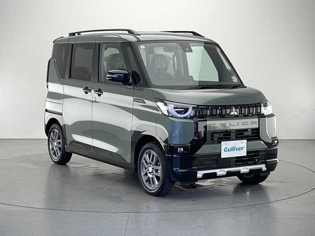 三菱 デリカミニ T プレミアム 長野県 2025(令7)年 0.1千km 緑 4WD/9型ディスプレイオーディオ/（Bluetooth＆AppleCarPlay＆AndroidAuto）/全周囲カメラ/プロパイロット/・追従型クルーズコントロール/・衝突被害軽減システム/・レーンキープアシスト/盗難防止装置/両側パワースライド/シートヒーター（前席）/ステアリングヒーター/純正ゴムマット/デジタルインナーミラー/ルーフレール/リアサーキュレーター/LEDヘッドライト/オートライト/15インチ純正アルミホイール/ライトレベライザー/スマートキー/スペアキー１本/保証書/取扱説明書