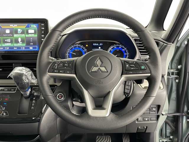 三菱 デリカミニ T プレミアム 長野県 2025(令7)年 0.1千km 緑 4WD/9型ディスプレイオーディオ/（Bluetooth＆AppleCarPlay＆AndroidAuto）/全周囲カメラ/プロパイロット/・追従型クルーズコントロール/・衝突被害軽減システム/・レーンキープアシスト/盗難防止装置/両側パワースライド/シートヒーター（前席）/ステアリングヒーター/純正ゴムマット/デジタルインナーミラー/ルーフレール/リアサーキュレーター/LEDヘッドライト/オートライト/15インチ純正アルミホイール/ライトレベライザー/スマートキー/スペアキー１本/保証書/取扱説明書