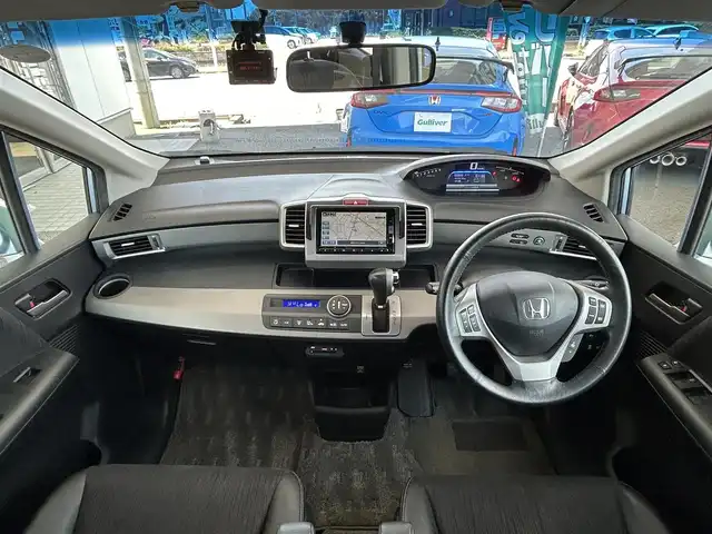 ホンダ フリード ハイブリット ジャストセレクション 茨城県 2014(平26)年 5.4万km プレミアムブルーオパールメタリック 純正ナビ/Bカメラ/クルーズコントロール/Bluetooth/両側パワースライドドア/ETC/ドライブレコーダー/ワンセグTV/3列シート/オートライト/スマートキー/純正AW/純正フロアマット/W＋サイドエアバッグ