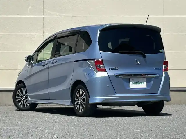 ホンダ フリード ハイブリット ジャストセレクション 茨城県 2014(平26)年 5.4万km プレミアムブルーオパールメタリック 純正ナビ/Bカメラ/クルーズコントロール/Bluetooth/両側パワースライドドア/ETC/ドライブレコーダー/ワンセグTV/3列シート/オートライト/スマートキー/純正AW/純正フロアマット/W＋サイドエアバッグ