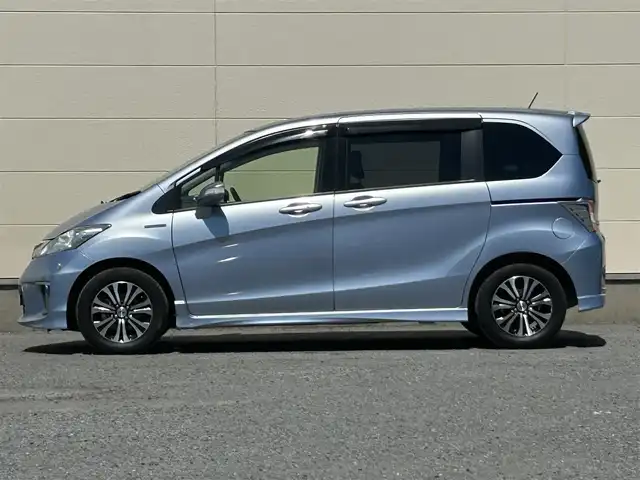 ホンダ フリード ハイブリット ジャストセレクション 茨城県 2014(平26)年 5.4万km プレミアムブルーオパールメタリック 純正ナビ/Bカメラ/クルーズコントロール/Bluetooth/両側パワースライドドア/ETC/ドライブレコーダー/ワンセグTV/3列シート/オートライト/スマートキー/純正AW/純正フロアマット/W＋サイドエアバッグ