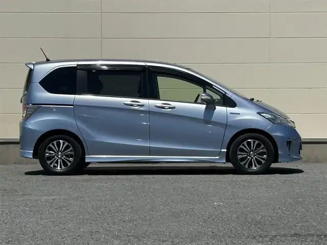 ホンダ フリード ハイブリット ジャストセレクション 茨城県 2014(平26)年 5.4万km プレミアムブルーオパールメタリック 純正ナビ/Bカメラ/クルーズコントロール/Bluetooth/両側パワースライドドア/ETC/ドライブレコーダー/ワンセグTV/3列シート/オートライト/スマートキー/純正AW/純正フロアマット/W＋サイドエアバッグ