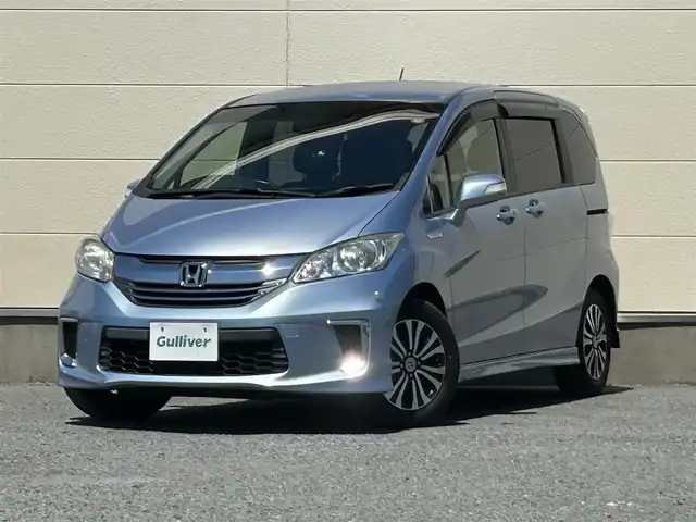 ホンダ フリード ハイブリット ジャストセレクション 茨城県 2014(平26)年 5.4万km プレミアムブルーオパールメタリック 純正ナビ/Bカメラ/クルーズコントロール/Bluetooth/両側パワースライドドア/ETC/ドライブレコーダー/ワンセグTV/3列シート/オートライト/スマートキー/純正AW/純正フロアマット/W＋サイドエアバッグ