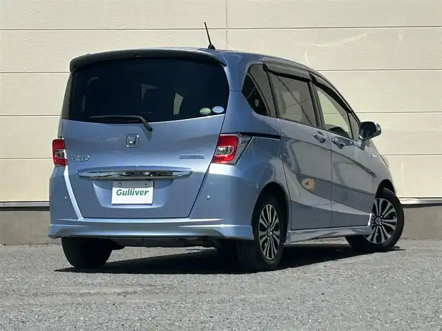 ホンダ フリード ハイブリット ジャストセレクション 茨城県 2014(平26)年 5.4万km プレミアムブルーオパールメタリック 純正ナビ/Bカメラ/クルーズコントロール/Bluetooth/両側パワースライドドア/ETC/ドライブレコーダー/ワンセグTV/3列シート/オートライト/スマートキー/純正AW/純正フロアマット/W＋サイドエアバッグ