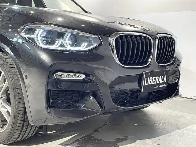ＢＭＷ Ｘ３ xDrive20d Mスポーツ 道央・札幌 2018(平30)年 2.3万km ソフィスト・グレー・ブリリアント・エフェクト ドライビング・アシスト・プラス/・ACC/・ステアリング＆レーン・コントロール・アシスト/・アクティブ・サイド・コリジョン・プロテクション/・レーン・ディパーチャー・ウォーニング/・レーン・チェンジ・ウォーニング/・後車衝突警告機能/・クロス・トラフィック・ウォーニング/・前車接近警告機能/・衝突回避・被害軽減ブレーキ/19インチ・Mライト・アロイホイール・ダブルスポーク・スタイリング/黒革レザーシート/パワーシート（D/N）/メモリー付パワーシート（D）/シートヒーター（前席・後席）/パーキング・アシスト・プラス/アダプティブLEDヘッドライト/オートライト/ワイヤレスチャージング/純正ドライブレコーダー/テールゲート/レインセンサー/ETC/・保証書、取扱説明書（有）/・スペアキー×１