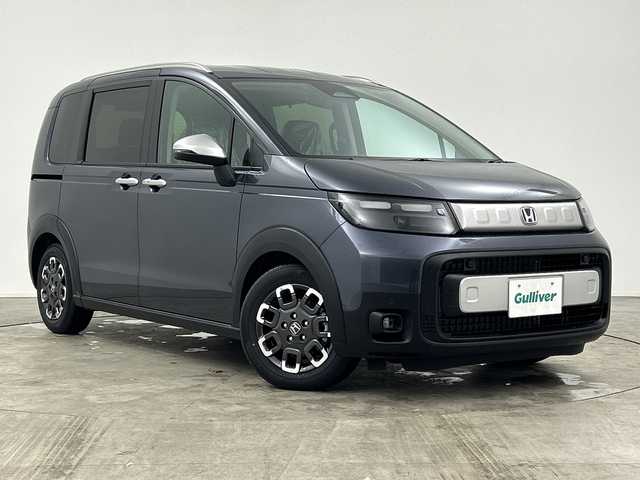 ホンダ フリード ハイブリット e:HEV クロスター 三重県 2025(令7)年 0.1千km メテオロイドグレーメタリック /登録済み未使用車//登録時走行距離5km//純正9インチGathersナビ　LXM-242ZFNI(207680円)//両側パワースライドドア//ホンダセンシング//衝突軽減ブレーキ//レーンキープアシスト//レーダークルーズコントロール//ブラインドスポットモニター//前後コーナーセンサー//DN席シートヒーター//バックカメラ//ルーフレール//リアサーキュレーター//サイドカーテンエアバッグ//ハーフレザーシート//ステアリングスイッチ