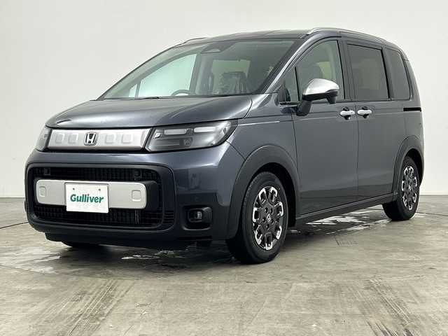 ホンダ フリード ハイブリット e:HEV クロスター 三重県 2025(令7)年 0.1千km メテオロイドグレーメタリック /登録済み未使用車//登録時走行距離5km//純正9インチGathersナビ　LXM-242ZFNI(207680円)//両側パワースライドドア//ホンダセンシング//衝突軽減ブレーキ//レーンキープアシスト//レーダークルーズコントロール//ブラインドスポットモニター//前後コーナーセンサー//DN席シートヒーター//バックカメラ//ルーフレール//リアサーキュレーター//サイドカーテンエアバッグ//ハーフレザーシート//ステアリングスイッチ