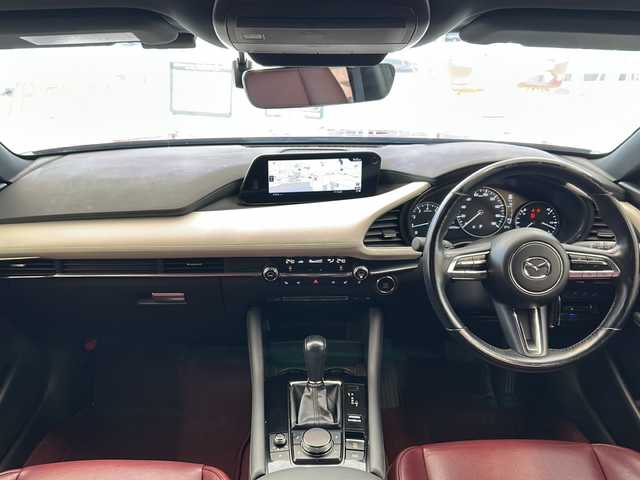 マツダ マツダ３ファストバック 20S 100周年特別記念車 岐阜県 2020(令2)年 6.3万km ソウルレッドクリスタルM 2020WCDOTY受賞記念モデル/BOSEサウンドシステム/全方位カメラ/純正ナビゲーション/フルセグテレビ/Bluetooth/CD/DVD再生/USB接続/HDMI/ETC/前後純正ドライブレコーダー/MRCC(マツダレーダークルーズコントロール)/クリアランスソナー/ブラインドスポットモニター/革シート/シートメモリー/シートヒーター/ステアリングヒーター/パドルシフト/ヘッドアップディスプレイ/電動パーキング/ブレーキホールド/アイドリングストップ/横滑り防止装置/リアウィンドウデフォッガー/プッシュスタート/スマートキー/オートライト/オートマチックハイビーム/LEDヘッドライト/純正18インチアルミホイール