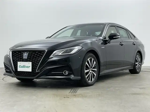 トヨタ クラウン ハイブリッド S Cパッケージ 岡山県 2018(平30)年 6万km プレシャスブラックパール 純正8インチナビ/・FM/AM/Bluetooth/フルセグ/CD/DVD/パノラマミックビューモニター/レザーシートパッケージ/・レザーシート/・ベンチレーション/・シートヒーター/ステアリングヒーター/トヨタセーフティーセンス/・プリクラッシュセーフティ/・レーンディパーチャーアラート/・レーダークルーズコントロール/・オートマチックハイビーム/ドライブレコーダー/ETC2.0/パドルシフト/BSM/純正アルミ/純正フロアマット