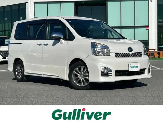 トヨタ ヴォクシー ZS 煌Z 奈良県 2013(平25)年 6.3万km ホワイトパールクリスタルシャイン 純正9インチナビ/（フルセグ/BT/CD/DVD）/バックカメラ/両側パワースライドドア/LEDヘッドライト/フォグランプ/ETC/純正16インチAW/保証書/取り扱い説明書/オートライト/３列シート/純正フロアマット/スマートキー/盗難防止装置
