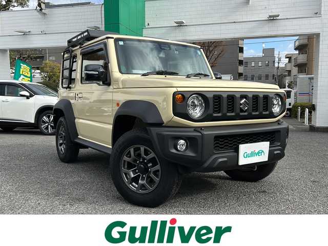 スズキ ジムニー シエラ JC 東京都 2024(令6)年 0.9万km シフォンアイボリーM ワンオーナー/４WD/モニター付DVD/CD/USBプレイヤー/【PVH-9300DVSZS】/ETC　Fドライブレコーダー/シートヒーター/クルーズコントロール/衝突軽減ブレーキ/レーンキープアシスト/LEDヘッドライト/スマートキー×２/ルーフキャリアー/リヤ/サイドラダー/サイドラックテーブル/セカンドサイドテーブル/EXEA/LEDシフトゲートパネル/ドアグリップポケットベース/スマホホルダータフネス/ドリンクホルダー/純正15インチアルミ