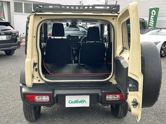 スズキ ジムニー シエラ JC 東京都 2024(令6)年 0.9万km シフォンアイボリーM ワンオーナー/４WD/モニター付DVD/CD/USBプレイヤー/【PVH-9300DVSZS】/ETC　Fドライブレコーダー/シートヒーター/クルーズコントロール/衝突軽減ブレーキ/レーンキープアシスト/LEDヘッドライト/スマートキー×２/ルーフキャリアー/リヤ/サイドラダー/サイドラックテーブル/セカンドサイドテーブル/EXEA/LEDシフトゲートパネル/ドアグリップポケットベース/スマホホルダータフネス/ドリンクホルダー/純正15インチアルミ