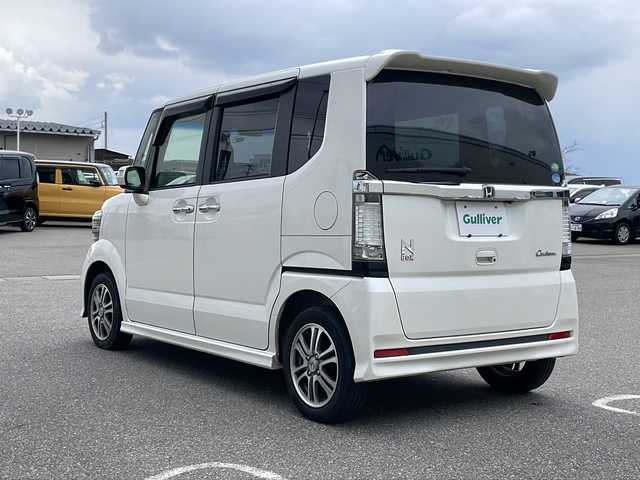 ホンダ Ｎ ＢＯＸ カスタム G SSパッケージ 新潟県 2014(平26)年 6.9万km プレミアムホワイトパール 社外ナビ（CN-R300D）/フルセグTV/両側パワースライドドア/バックカメラ/ETC/ステアリングスイッチ/純正フロアマット/ドアバイザー/HIDオートライト/プッシュスタート