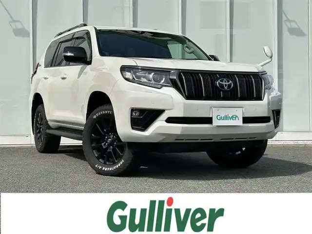 トヨタ ランドクルーザー プラド TX-L 70thアニバーサリーLTD 福岡県 2021(令3)年 4.1万km ホワイトパールクリスタルシャイン ・純正ナビ 9インチ/（BLUETOOTH/フルセグ/バックカメラ/・ETC/・クルーズコントロール/・ロードサインアシスト/・4WD/・シートヒーター/・エアシート/・プリクラッシュセーフティ/・コーナーセンサー/・クリアランスソナー/・LEDライト/・カーテンエアバッグ/・電動格納ミラー/・ルーフレール/・アルミホイール