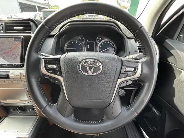 トヨタ ランドクルーザー プラド TX-L 70thアニバーサリーLTD 福岡県 2021(令3)年 4.1万km ホワイトパールクリスタルシャイン ・純正ナビ 9インチ/（BLUETOOTH/フルセグ/バックカメラ/・ETC/・クルーズコントロール/・ロードサインアシスト/・4WD/・シートヒーター/・エアシート/・プリクラッシュセーフティ/・コーナーセンサー/・クリアランスソナー/・LEDライト/・カーテンエアバッグ/・電動格納ミラー/・ルーフレール/・アルミホイール