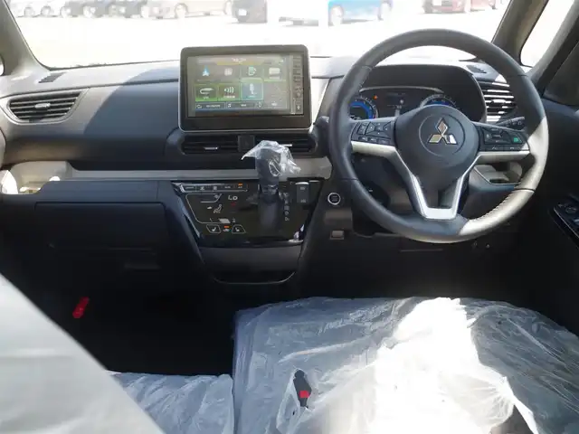 三菱 デリカミニ T プレミアム 千葉県 2025(令7)年 0.1千km アメジストブラック/シルキーホワイト T　PREMIUM　4WD　9型ディスプレイオーディオ（121/330）CHAMONIXパッケージ（179190）/e-Assist/・衝突被害軽減ブレーキシステム（FCM）/・車線逸脱警報システム（LDW）/・誤発進抑制機能（前進＆後退時）（UMS）/・レーダークルーズコントロールシステム（ACC）/・オートマチックハイビーム[AHB]/マイパイロット/デジタルインナーミラー/ハンズフリー両側パワースライドドア/ディスプレイオーディオ/【Bluetooth接続】/【Apple CarPlay　Android Auto対応】/マルチアラウンドモニター/ハーフレザーシート/前席シートヒーター/革巻きステアリング/ステアリングスイッチ/ステアリングヒーター/パドルシフト/LEDヘッドライト/フォグライト/ウインカーミラー/コーナーセンサー/純正15インチアルミホイル/サイド/カーテンエアバッグ/キーレスオペレーションシステム