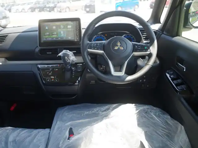 三菱 デリカミニ T プレミアム 千葉県 2025(令7)年 0.1千km アメジストブラック/シルキーホワイト T　PREMIUM　4WD　9型ディスプレイオーディオ（121/330）CHAMONIXパッケージ（179190）/e-Assist/・衝突被害軽減ブレーキシステム（FCM）/・車線逸脱警報システム（LDW）/・誤発進抑制機能（前進＆後退時）（UMS）/・レーダークルーズコントロールシステム（ACC）/・オートマチックハイビーム[AHB]/マイパイロット/デジタルインナーミラー/ハンズフリー両側パワースライドドア/ディスプレイオーディオ/【Bluetooth接続】/【Apple CarPlay　Android Auto対応】/マルチアラウンドモニター/ハーフレザーシート/前席シートヒーター/革巻きステアリング/ステアリングスイッチ/ステアリングヒーター/パドルシフト/LEDヘッドライト/フォグライト/ウインカーミラー/コーナーセンサー/純正15インチアルミホイル/サイド/カーテンエアバッグ/キーレスオペレーションシステム