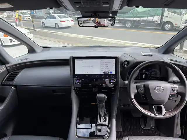 トヨタ アルファード Z 京都府 2024(令6)年 0.2万km ブラック ワンオーナー/ムーンルーフ/デジタルインナーミラー/ＴＶキャンセラー/１４インチディスプレーオーディオ/　 ナビ フルセグＴＶ USB HDMI BT/   APPLE CAR PLAY/   ANDROID AUTO/パノラミックビューカメラ/１・２列目ＰＷシート/１・２列目エアシート/電動リアゲート/ビルトインETC2.0/ステアリングヒーター/置くだけ充電/全列USB給電ポート/２列目１００Ｖ１００Ｗコンセント/セーフティセンス/　・PCS ・LTA ・LDA ・BSM/　・追従式レーダークルーズ/　・アダクティブハイビーム/前後クリアランスソナー/LEDヘッドライト/LEDフォグ/シーケンシャルターンランプ/スペアスマートキー/新車保証書
