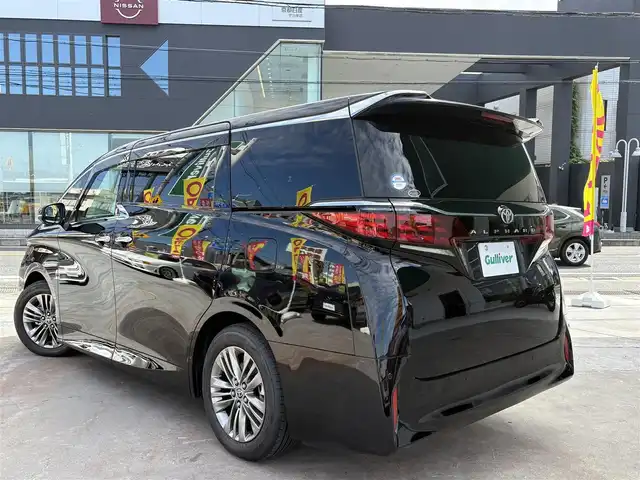 トヨタ アルファード Z 京都府 2024(令6)年 0.2万km ブラック ワンオーナー/ムーンルーフ/デジタルインナーミラー/ＴＶキャンセラー/１４インチディスプレーオーディオ/　 ナビ フルセグＴＶ USB HDMI BT/   APPLE CAR PLAY/   ANDROID AUTO/パノラミックビューカメラ/１・２列目ＰＷシート/１・２列目エアシート/電動リアゲート/ビルトインETC2.0/ステアリングヒーター/置くだけ充電/全列USB給電ポート/２列目１００Ｖ１００Ｗコンセント/セーフティセンス/　・PCS ・LTA ・LDA ・BSM/　・追従式レーダークルーズ/　・アダクティブハイビーム/前後クリアランスソナー/LEDヘッドライト/LEDフォグ/シーケンシャルターンランプ/スペアスマートキー/新車保証書