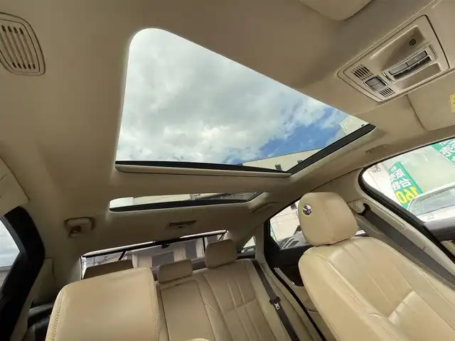 ジャガー ＸＪ ラグジュアリー 岡山県 2011(平23)年 13.9万km フジホワイト 登録時走行距離138764km/サンルーフ/純正HDDナビ/(AM/FM/TV/DISC)/クルーズコントロール/クリアランスソナー/バックカメラ/ETC/ドライブレコーダー/D+N席シートヒーター/D+N席パワーシート/D席シートメモリ/パドルシフト/電動リアゲート/スマートキー/純正19インチアルミホイール