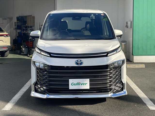 トヨタ ヴォクシー ハイブリッド S－Z 京都府 2022(令4)年 4.9万km ホワイトパールクリスタルシャイン 純正１０インチディスプレイオーディオ　ナビ　フルセグ　Ｂｌｕｅｔｏｏｔｈオーディオ　バックカメラ　後席フリップダウンモニター　レーダークルーズ　両側パワースライド　ＬＥＤライト　シートヒーター　前後ドラレコ　クリアランスソナー　ビルトインETC