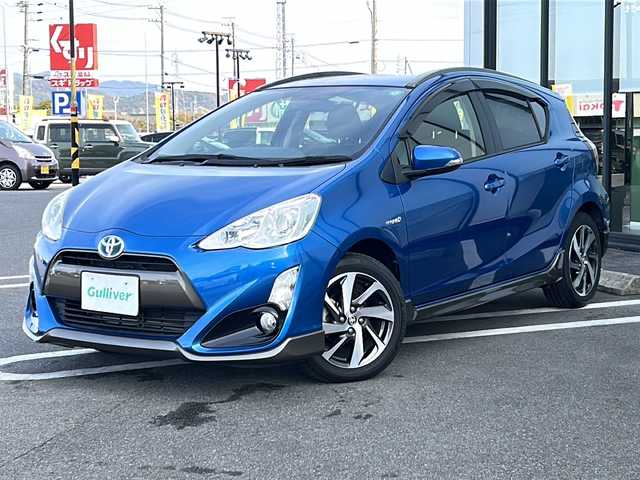 トヨタ アクア X－URBAN 岐阜県 2015(平27)年 11.5万km コバルトブルーメタリック 【登録時走行距離：114635km】/社外ナビ/フルセグテレビ/バックカメラ/ルーフレール/Ｘ－ＵＲＢＡＮエアロ/ＬＥＤヘッドライト/純正アルミホイール/純正フロアマット/ドアバイザー/フォグランプ/ハーフレザーシート/ETC/禁煙車/プッシュスタート/スマートキー/横滑り防止装置