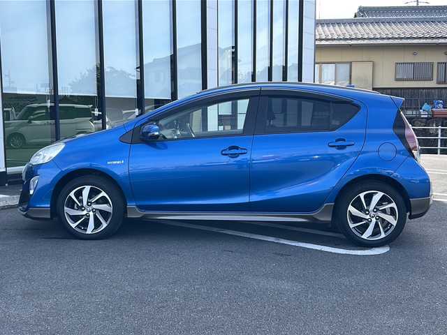 トヨタ アクア X－URBAN 岐阜県 2015(平27)年 11.5万km コバルトブルーメタリック 【登録時走行距離：114635km】/社外ナビ/フルセグテレビ/バックカメラ/ルーフレール/Ｘ－ＵＲＢＡＮエアロ/ＬＥＤヘッドライト/純正アルミホイール/純正フロアマット/ドアバイザー/フォグランプ/ハーフレザーシート/ETC/禁煙車/プッシュスタート/スマートキー/横滑り防止装置