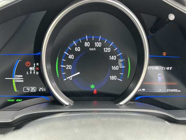 ホンダ フィット ハイブリット 茨城県 2015(平27)年 7.7万km ホワイトオーキッドパール クルーズコントロール/フルセグTV/Panasonic7インチナビ/BT/CD/ipod/SD/オートエアコン/純正フロアマット/ビルトインETC/純正16インチアルミホイール/W＆サイドエアバック/バックカメラ/パーキングアシスト/アイドリングストップ/横滑り防止機能/盗難防止装置/LEDヘッドライト/オートライト/禁煙車