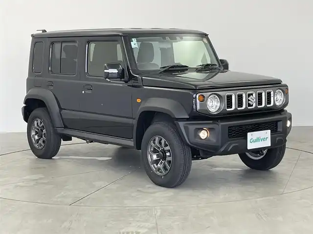 スズキ ジムニー ノマド FC 愛知県 2025(令7)年 0.1万km未満 黒 登録済み未使用車　/４WD　/スズキデュアルカメラサポート/コーナーセンサー　/アダプティブクルーズコントロール　/車線逸脱防止装置　/衝突軽減ブレーキ　/後方誤進抑制機能　/ステアリングリモコン　/革巻きステアリング　/フォグランプ　/ミラーヒーター　/シートヒーター　